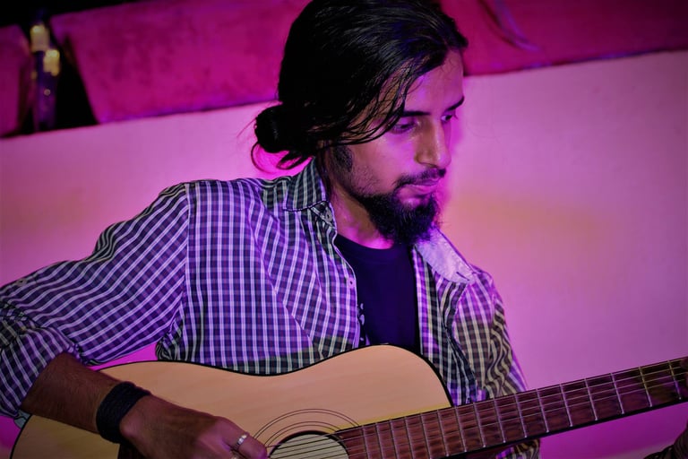Mradul Singhal, a singer-songwriter performs at an Orange Octopus event in 2017.