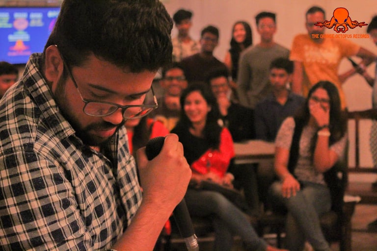 Namit Jain, a stand up comedian, performs at an Orange Octopus event in 2018
