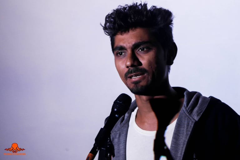 Saanjhj, a poet performs at an Orange Octopus event in 2018