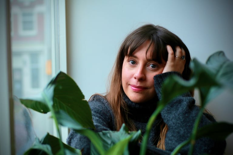 Bryony Cole, actor, in a living room