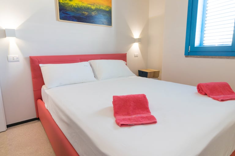 a bed with towels and towels on it