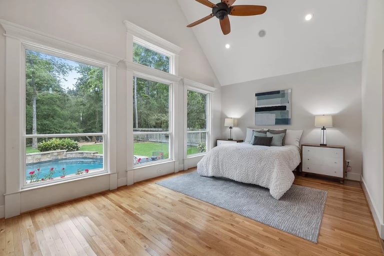 Gorgeous view of Primary bedroom with pool view