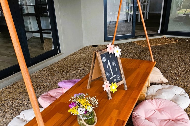 teepee picnic table daisy bloom theme with balloon garland