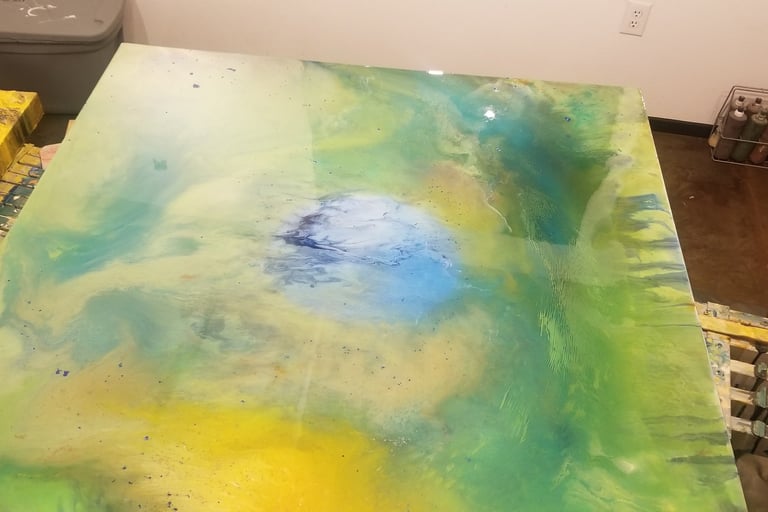 a painting of a table with a painting on it