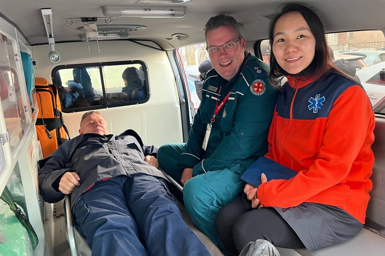 EMS Global volunteers in a Mongolian Ambulance with a Mongolian Doctor