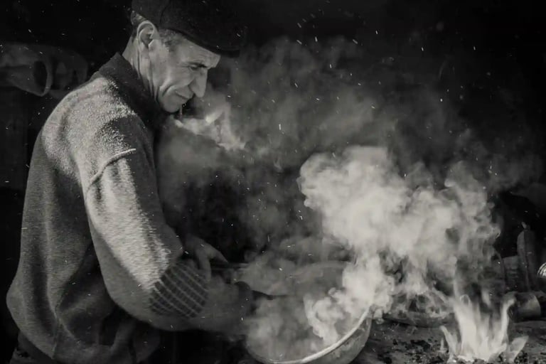 A Peruvian man cooking in a seafood restaurant