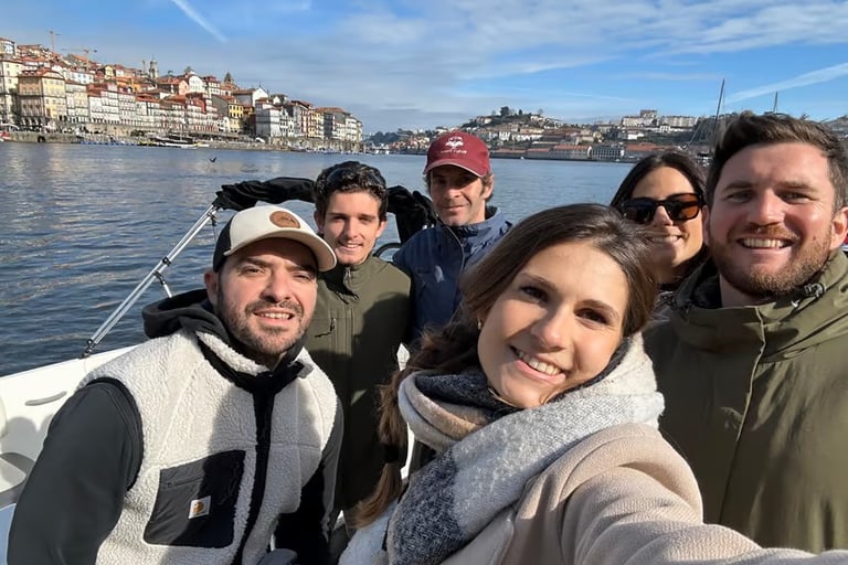 Captain Francisco, owner of Ricky’s Douro, posing for a group photo with happy guests