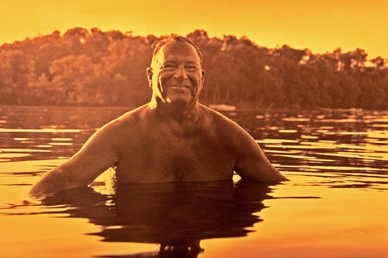 portrait of man cooling off in water