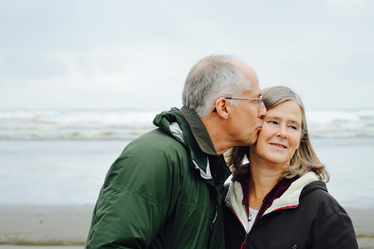 Empty nesters with mixed feelings about their children moving forward into adulthood