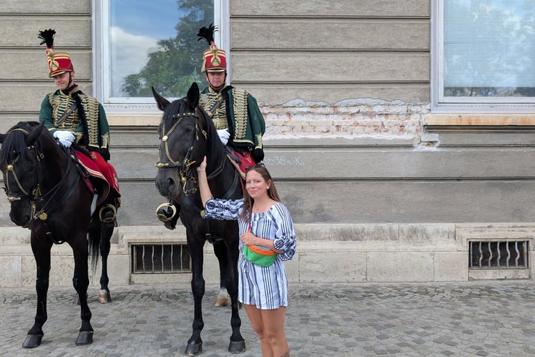 Samantha petting a Hungarian Royal guard horse at Castle Hill in Budapest, Hungary