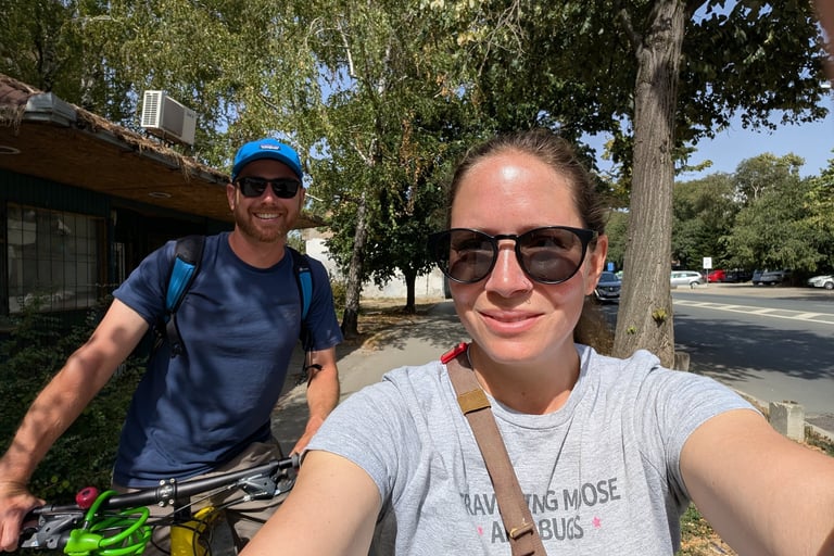 Don and Samanthas riding bikes through Novi Sad Serbia 