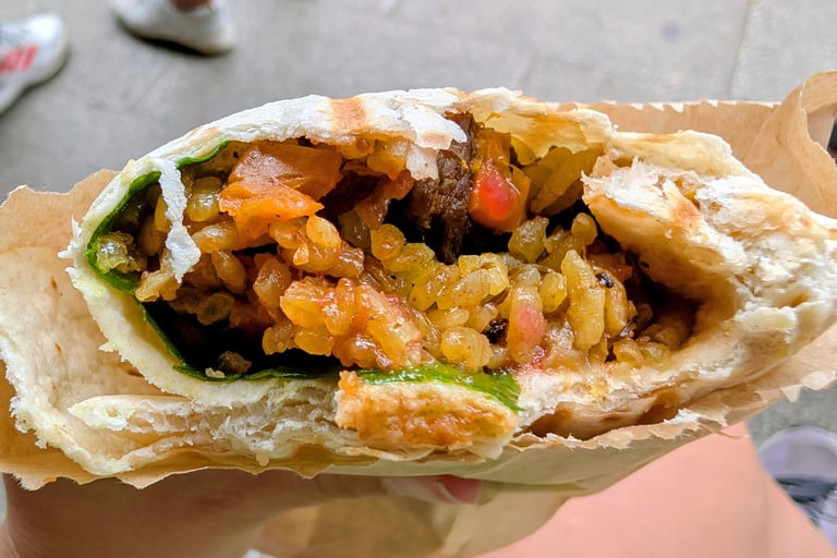 A plove wrap filled with rice, meat and vegetables in Belgrade Serbia