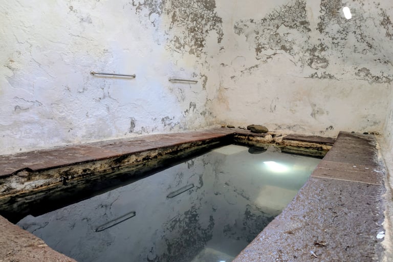 Natural thermal spring built on the shore of the Aegean sea at Paralia Efthalou near Mithymna, Greec
