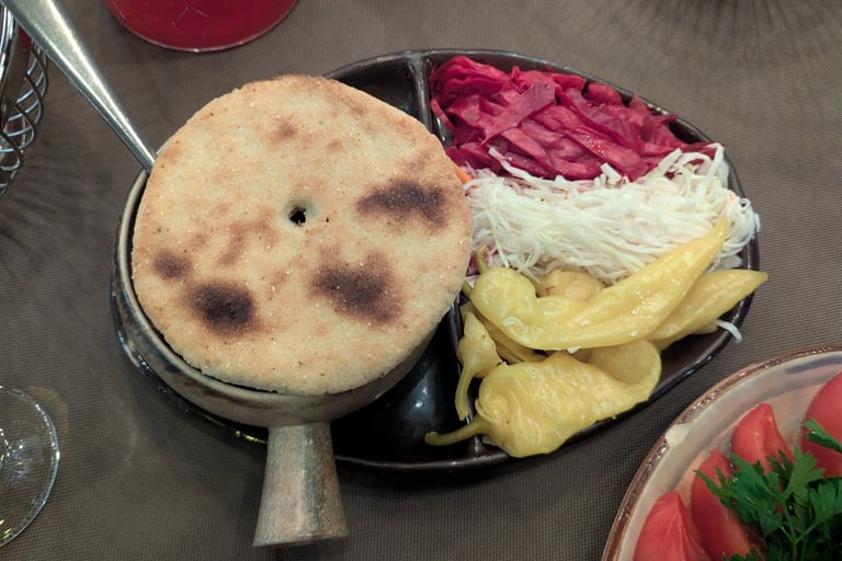 lobio with bread and pickeled vegetables from Vafe Daphna in Tbilisi Georgia 