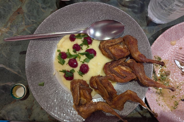 Fried quail with Tashmijabi from Cafe daphna in tbilisi Georiga