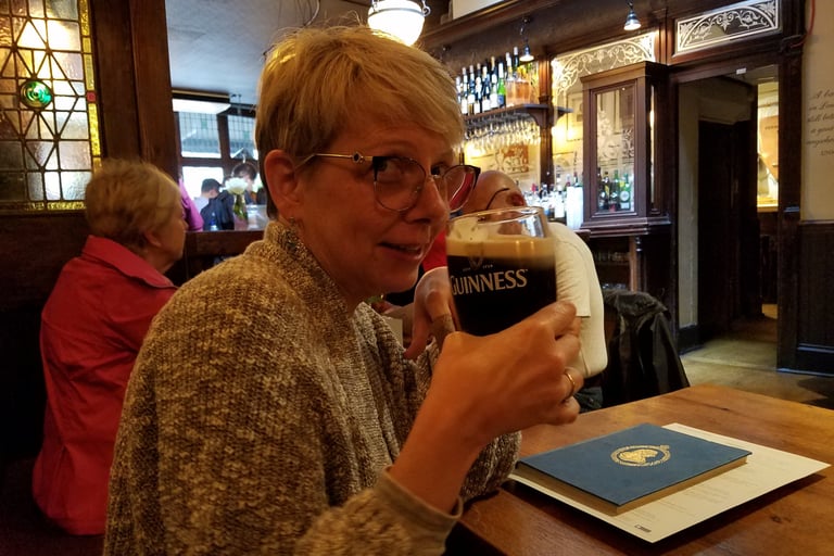 Lady Michelle enjoys a pint at Buckingham Arms Pub in London, England