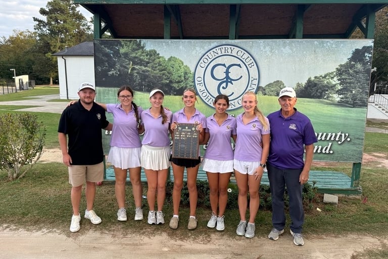 a santa clause is holding a christmas card