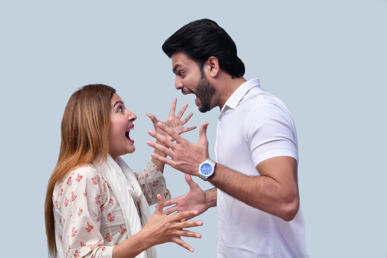 Couple experiencing intense conflict during a moment of anger, highlighting the need for anger manag