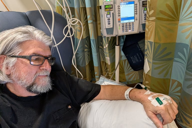 Greg Rowland receiving a Lecanemab infusion at Duke Health