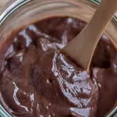 Raw cacao powder and honey ingredients for DIY anti-aging face mask
