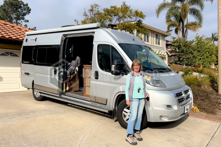 Lady standing in front of her Ram Travato 2017