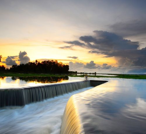 afsluitdijk - a waterfall in the middle of a river