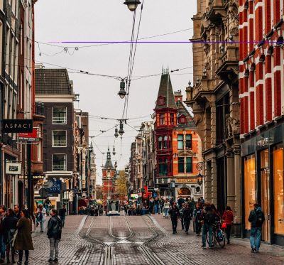 amsterdam - a city street scene with a trampoline trampoline trampoline tram