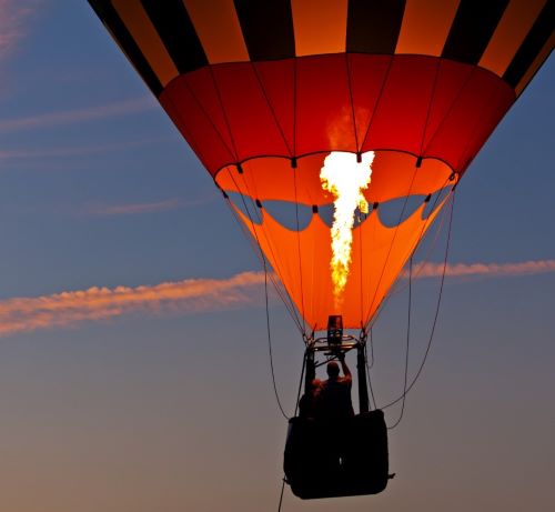 a hot air balloon being flown in a hot air balloon