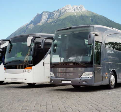 a couple of buses parked next to each other