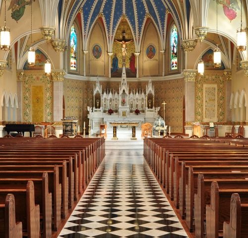 a church with a black and white checkered floor