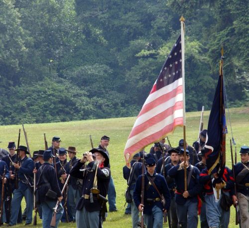a group of men and women in uniform uniforms and uniforms