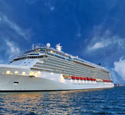 a cruise ship in the ocean with a cruise ship in the background