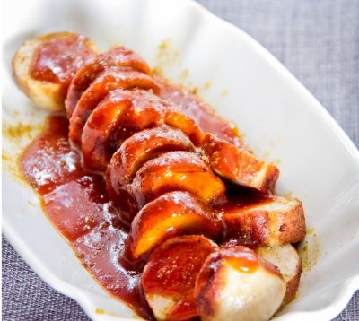 a plate of sausages and sausages on a plate
