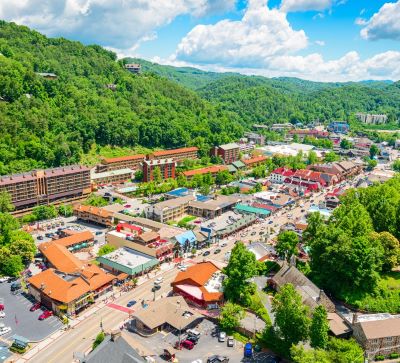 a view of a town with a mountain view