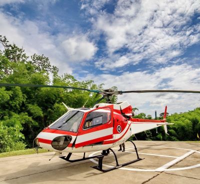 a helicopter with a red and white stripe on it