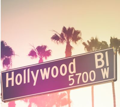 a street sign that says hollywood boulevard
