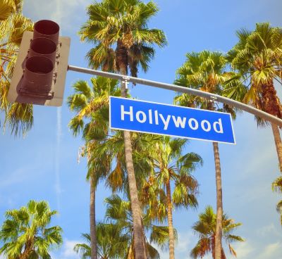 a street sign that says hollywood boulevard