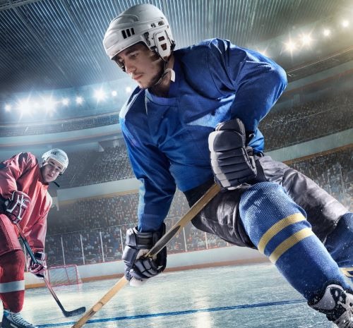 a hockey player is playing hockey in a stadium