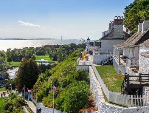 view of an island with see trees and old building structures