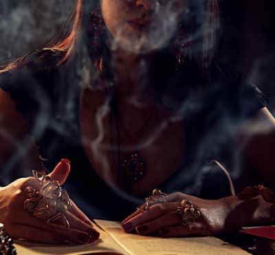 magic - a woman with a cigarette in her hand