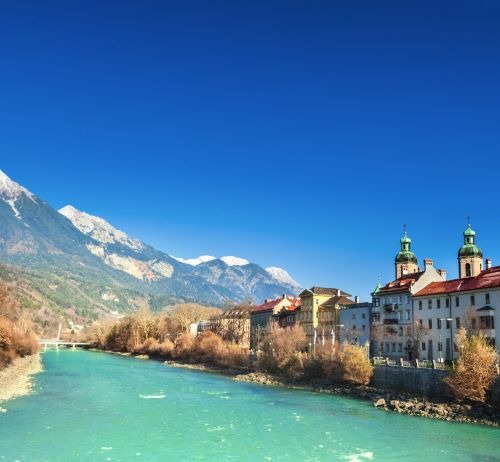 a river with a mountain in the background