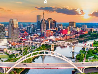 Nashville skyline with a bridge over a river