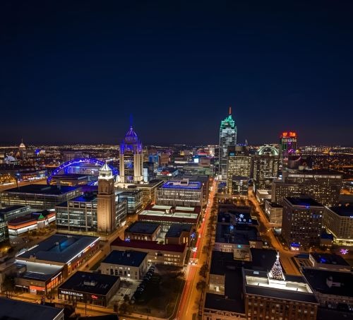 a city skyline view of a city at night