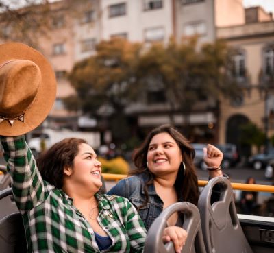 women having fun in a bus