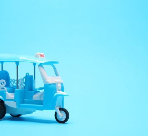 a rickshaw with a blue sky background