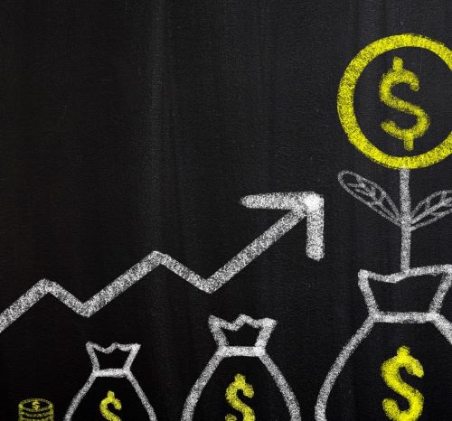 a chalkboard drawing of a graphing of a graphing line of money bags