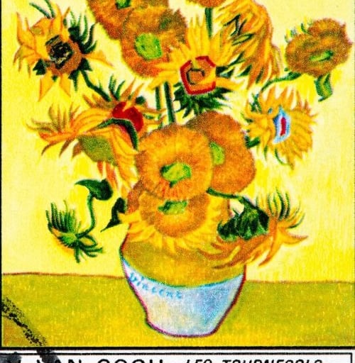Vincent van Gogh Les Tournesols oil painting of yellow sunflowers in a white vase.