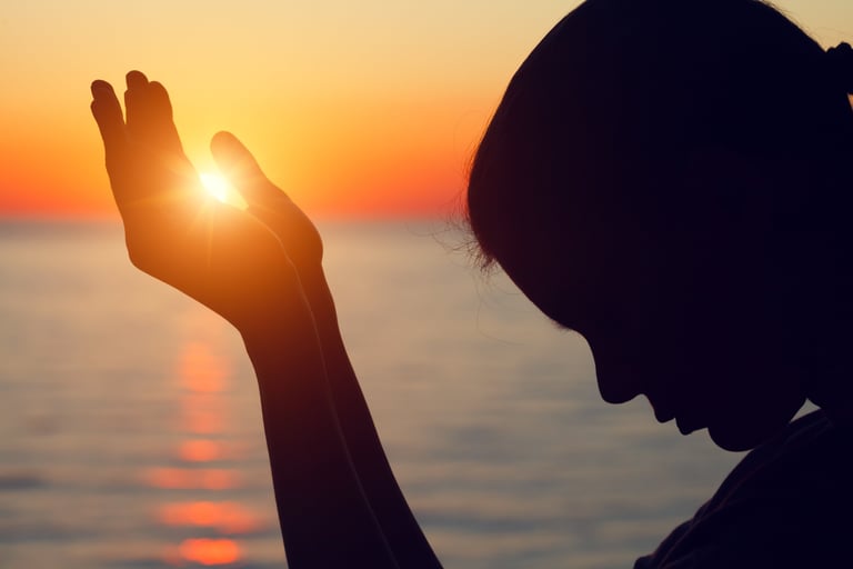 Woman in prayer - receiving answers from God through faith and prayer