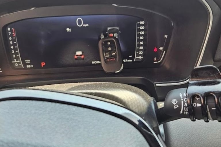 Smart key programming in Marion NC with key fob on vehicle dashboard