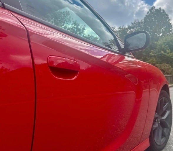 Red Dodge Charger lock representing auto locksmith in Arden, NC including lockout, key duplication, & ignition repair